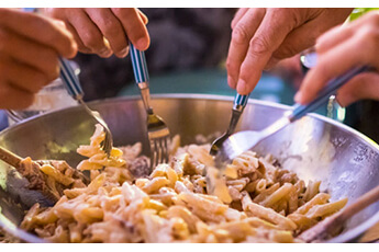 Friends eating trendy meal