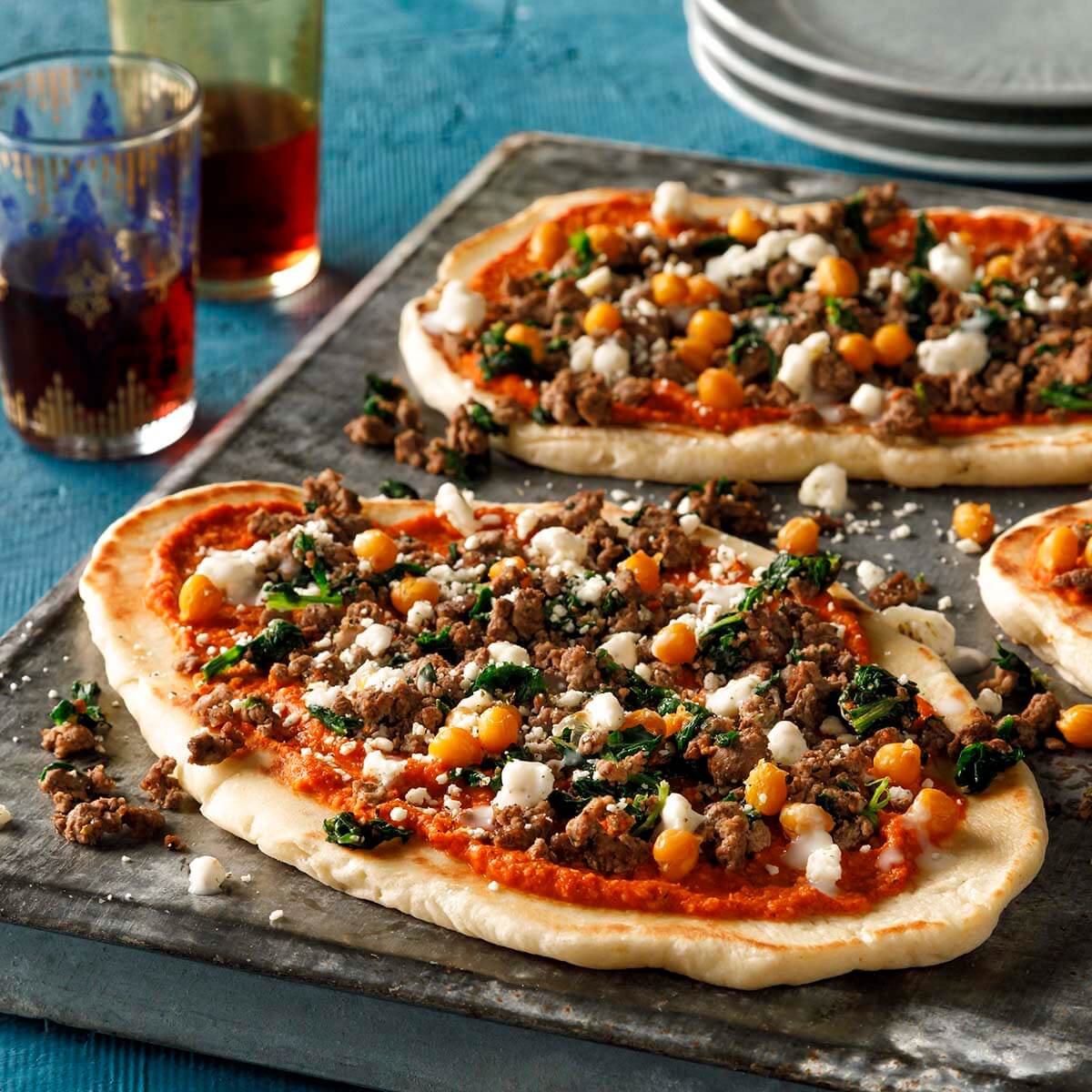 Kwarma Spinach Manakeesh with Romesco Sauce Recipe