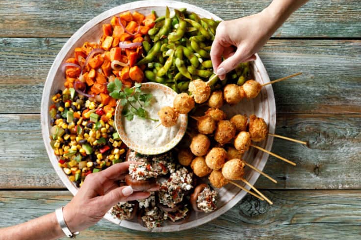 Croquette skewers and vegetables dish