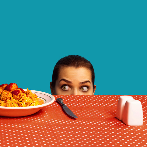 Girl peeping at food